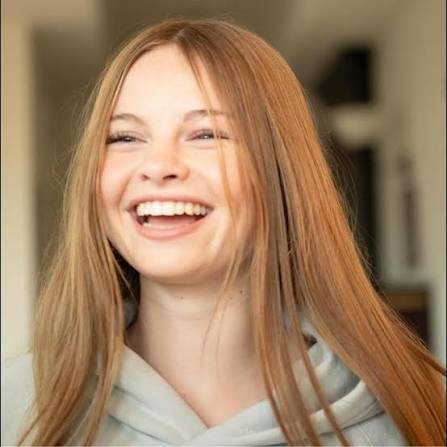 Salish Matter smiling for a portrait photo