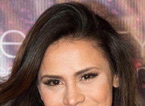 Andrea Espada smiling during a photo session