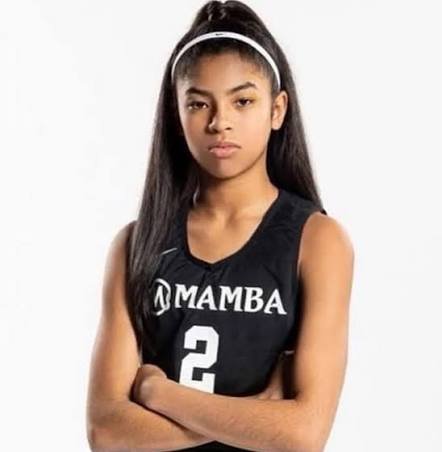 Gianna Bryant smiling at a basketball event