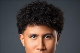 Canadian actor Casey Trotter posing for a photo