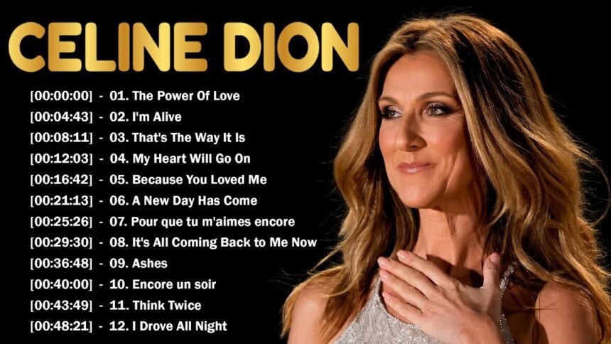 Celine Dion singing into a microphone on stage