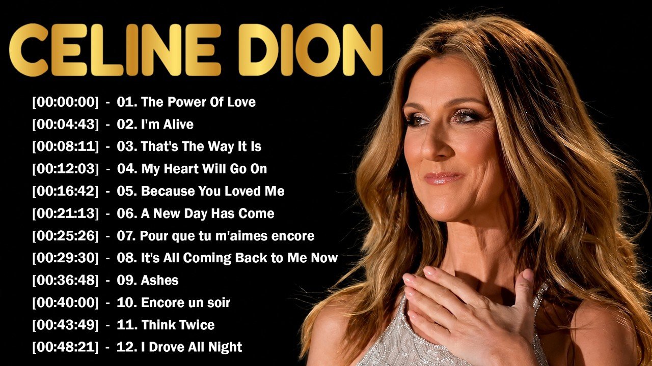 Celine Dion singing into a microphone on stage