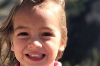 Cora Bennett smiling for a portrait photo