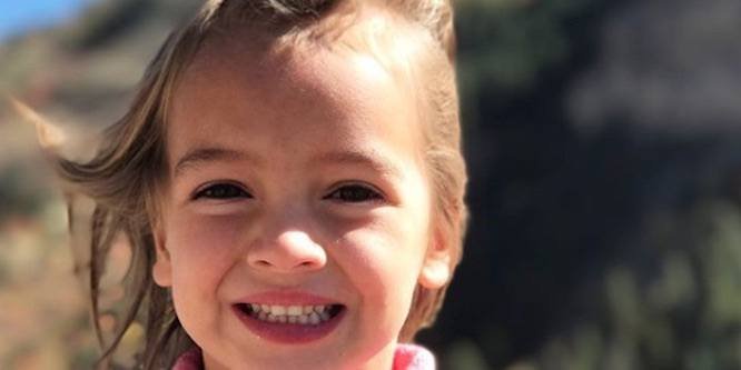 Cora Bennett smiling for a portrait photo