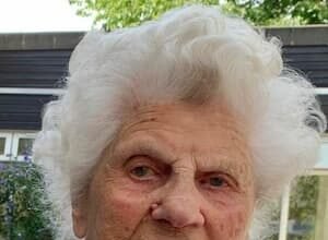 Ethel Caterham smiling, recognized as the world's oldest verified living person.