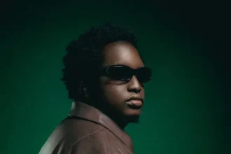 Ugandan Afro-fusion singer Joshua Baraka posing for a photo