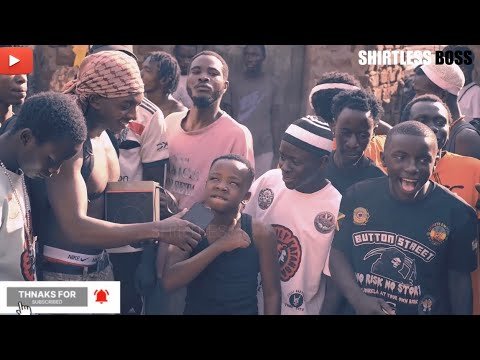 Warden kartel in a music studio setting performing a rap freestyle