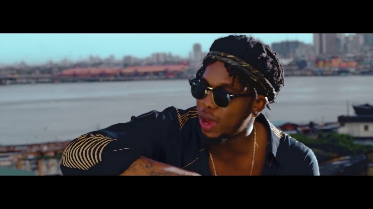 Runtown performing in his official music video for Mad Over You