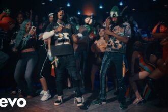 JETTI and DJ CHEEM performing in the official Party Lit music video.