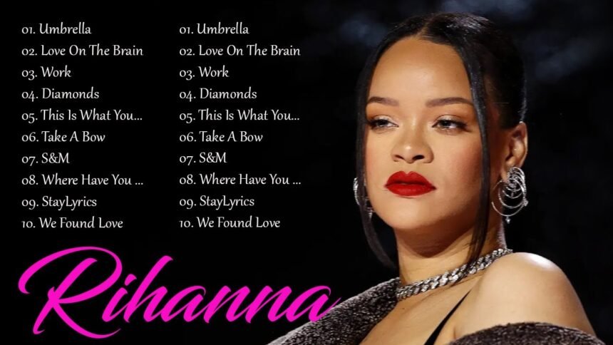 Global pop icon Rihanna singing into a microphone on stage