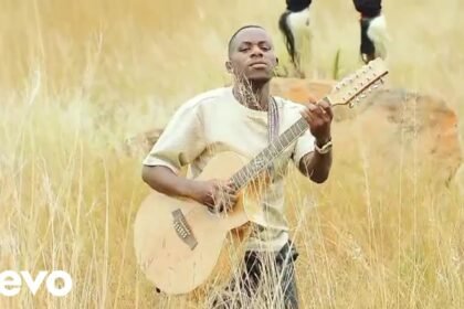MENZI MUSIC performing in the official music video for Vuma