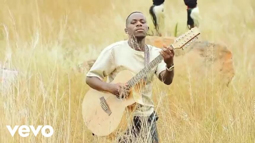 MENZI MUSIC performing in the official music video for Vuma