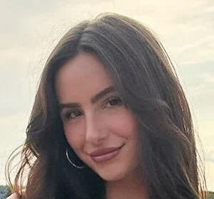 Ashtin Earle smiling for a portrait photo