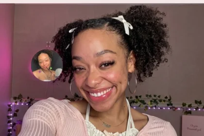 Chyna Unique, a 28‑year‑old ASMR creator, smiling in a studio setting with soft lighting