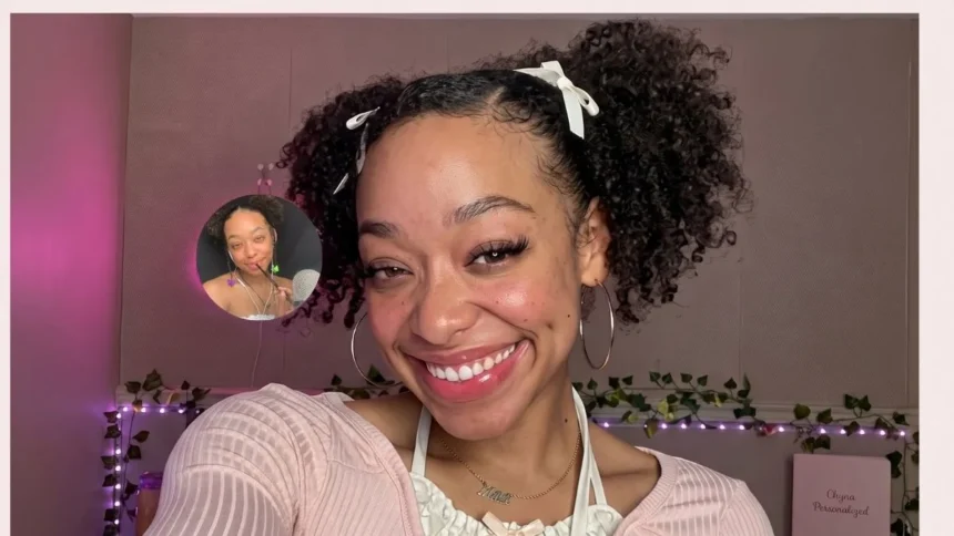 Chyna Unique, a 28‑year‑old ASMR creator, smiling in a studio setting with soft lighting