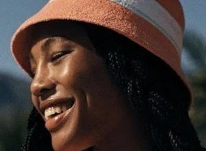 Quenlin Blackwell smiling in a professional portrait photo