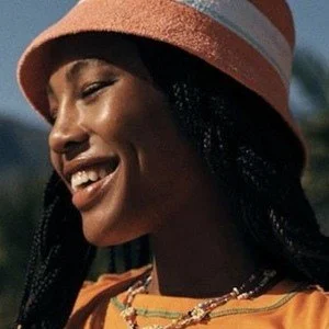 Quenlin Blackwell smiling in a professional portrait photo