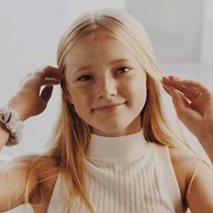 Rylee Arnold smiling during a portrait session