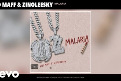 Ayo Maff and Zinoleesky stand side by side on stage while performing their single Malaria, wearing casual street clothing.