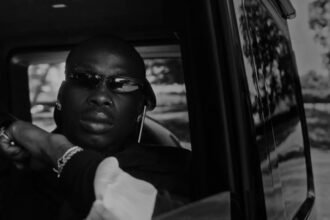 Fireboy DML together with JAZZWRLD and Thukuthela in the official video for IMALI