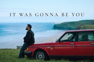 Passenger performing in the music video for It Was Gonna Be You