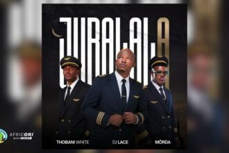 DJ Lace, MÖRDA and Thobani White on stage performing their song Jubalala, with bright lights and a crowd watching