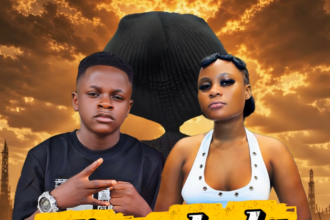 Sandra Naxx and Champion Ogudo singing together on stage during a live performance of Kinyakula
