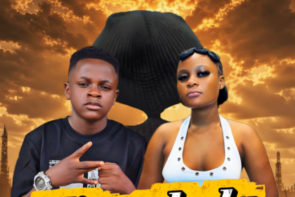 Sandra Naxx and Champion Ogudo singing together on stage during a live performance of Kinyakula