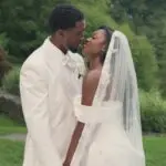 Coco Jones performing in her Love Me Through visualizer video.