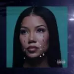 Jhené Aiko posing for her song release Lullaby