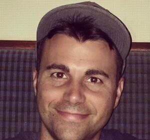 Mark Rober posing for a portrait photo