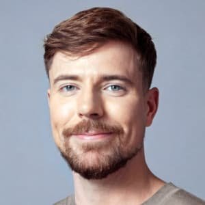 James Stephen Donaldson, known as MrBeast, speaking on stage during a charitable event in 2025