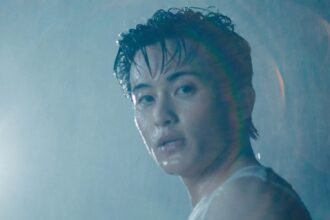 Mark Lee performing in the official music video for My Friend