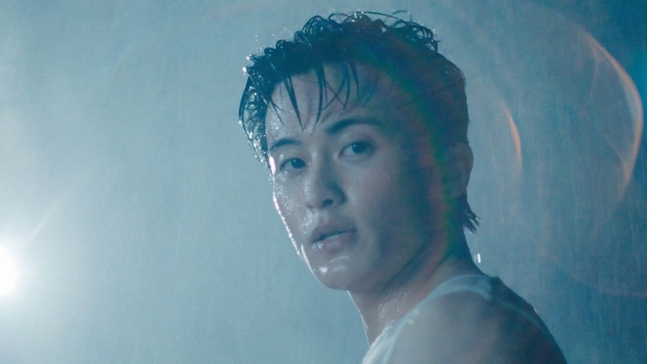 Mark Lee performing in the official music video for My Friend