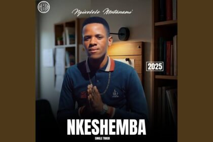 Nkeshemba standing outdoors in traditional attire