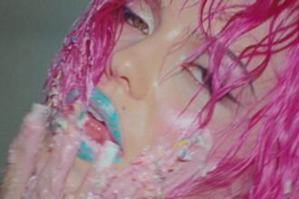 ADÉLA performing in her Nicole Kidman official music video