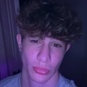 Nidal Wonder doing a backflip during a YouTube challenge video.
