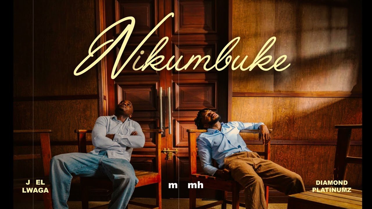 Joel Lwaga and Diamond Platnumz standing side by side with the Nikumbuke lyric video text displayed in the background.