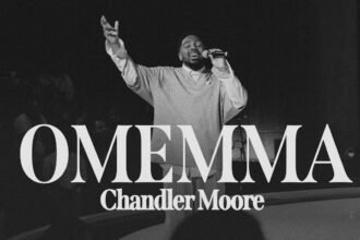 Chandler Moore singing live on stage during his Omemma performance in Los Angeles.