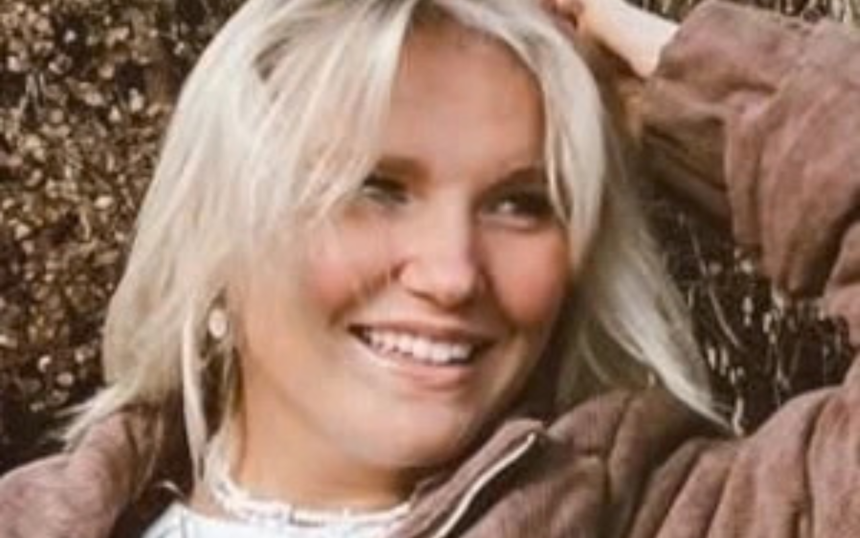 SaiDee Nelson smiling while filming a YouTube video for the Not Enough Nelsons family channel