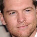 Australian actor Sam Worthington attending a red carpet event.