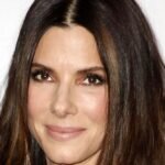 Actress Sandra Bullock smiling on the red carpet
