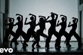 LISA performing in the official music video for SaWaDiKa
