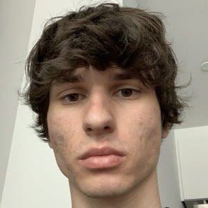 Portrait of Martin Andrijasevic, known as thatmartinkid, a Canadian TikTok comedian wearing a casual shirt and smiling