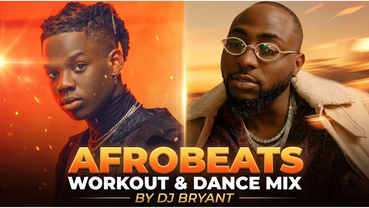 DJ Bryant performing a live set of the Afrobeats Workout & Dance Mix, surrounded by colorful lights and a crowd exercising