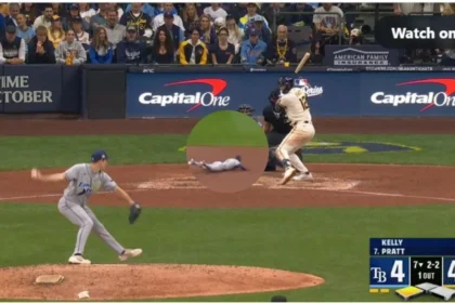Milwaukee Brewers players celebrating on the field after winning Game 2 of the World Series