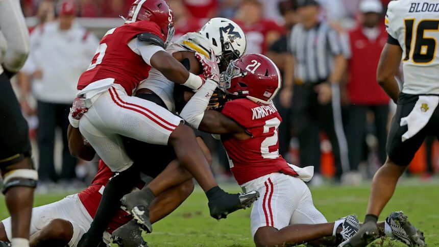 Dre Kirkpatrick Jr. playing defensive back for the Alabama Crimson Tide football team