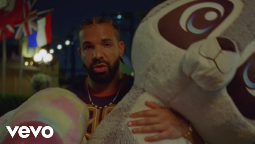 Drake, Don Toliver and Yebba performing Cold Shoulder in the official music video, showing the three artists on stage with bright lighting and a dark background.
