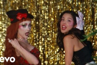 Olivia Rodrigo featuring Chappell Roan performing expectations in music video
