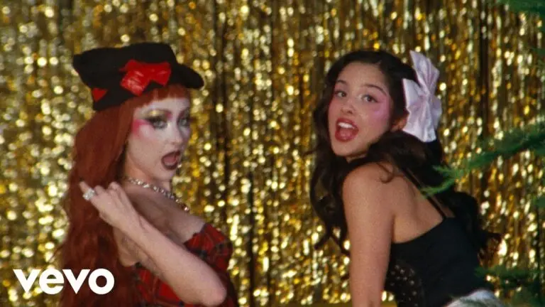 Olivia Rodrigo featuring Chappell Roan performing expectations in music video